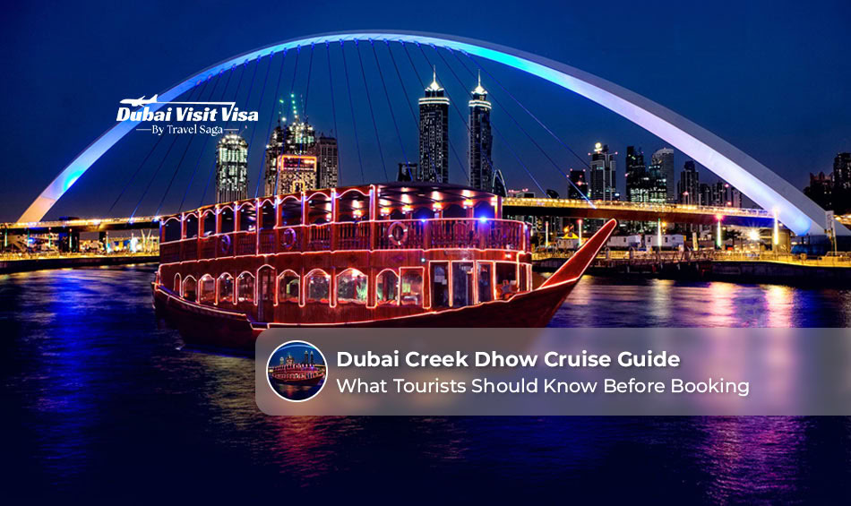 Traditional dhow cruising along Dubai Creek with the city skyline in the background.