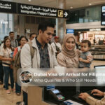 Filipino travellers reviewing passport and entry documents before travelling to Dubai.